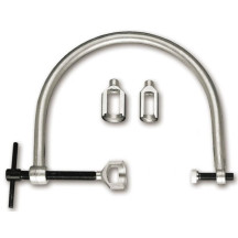 1452K - MORSETTO ALZAVALVOLE CON 3 FLANGE